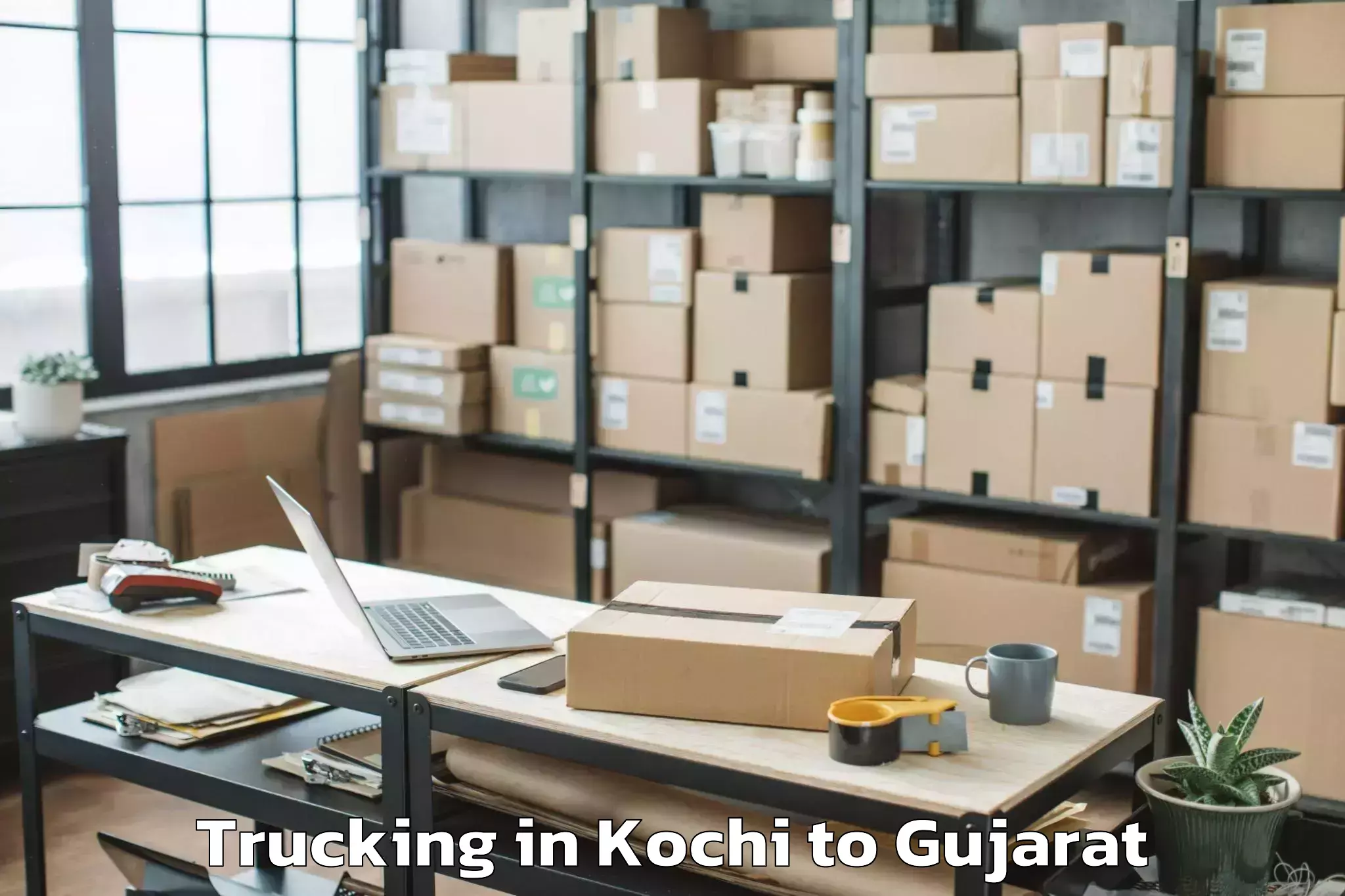 Leading Kochi to Upleta Trucking Provider